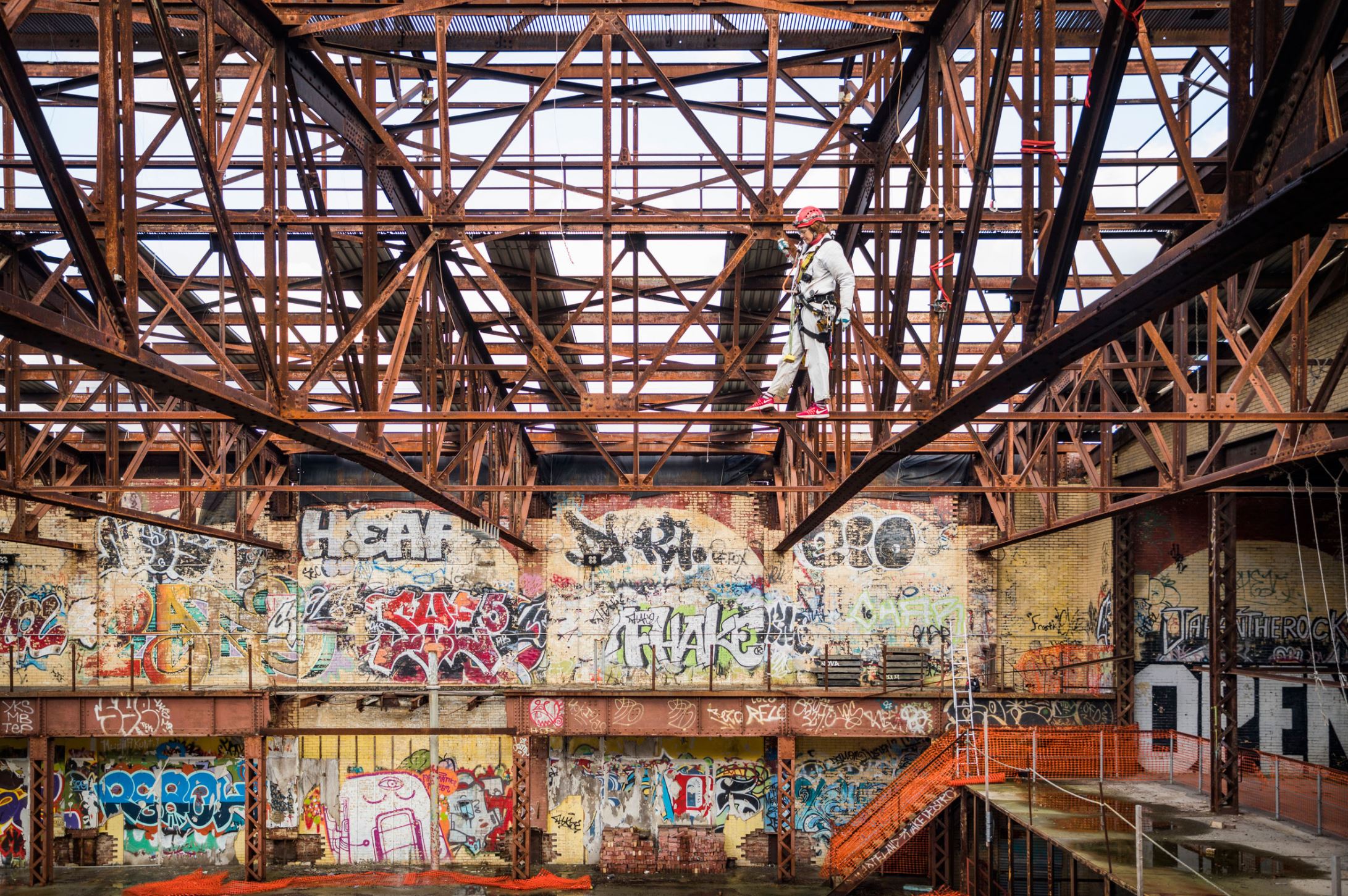 Worker on the beams during the construction process.