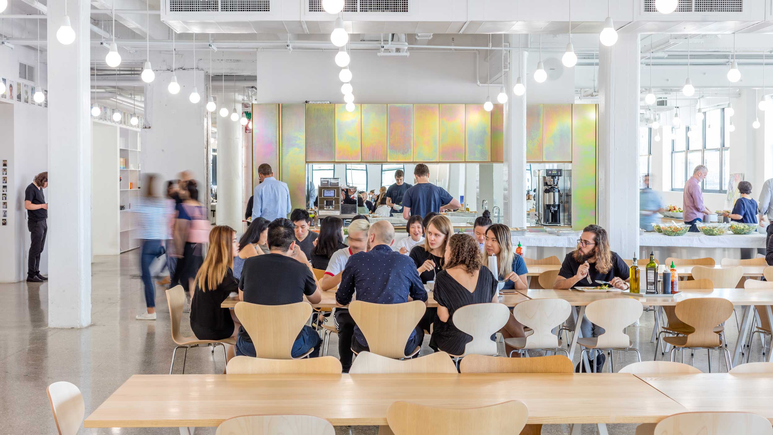 People eating lunch at Bjarke Ingels Group.